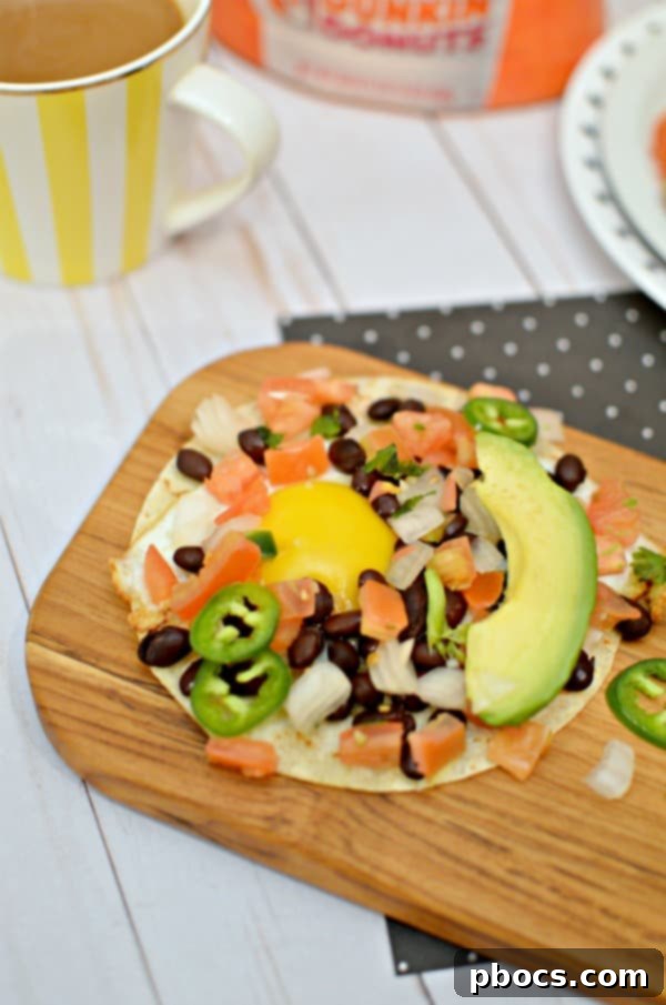 Delicious Black Bean Breakfast Tacos Delicious Black Bean Breakfast Tacos topped with fresh avocado and pico de gallo