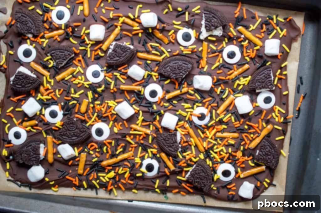 Firm Halloween candy bark after chilling, ready to be broken into pieces