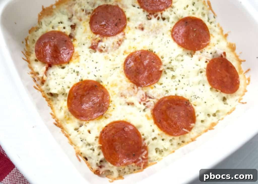 Freshly baked Easy Keto Pizza Casserole, golden brown and bubbling, ready to be served and enjoyed