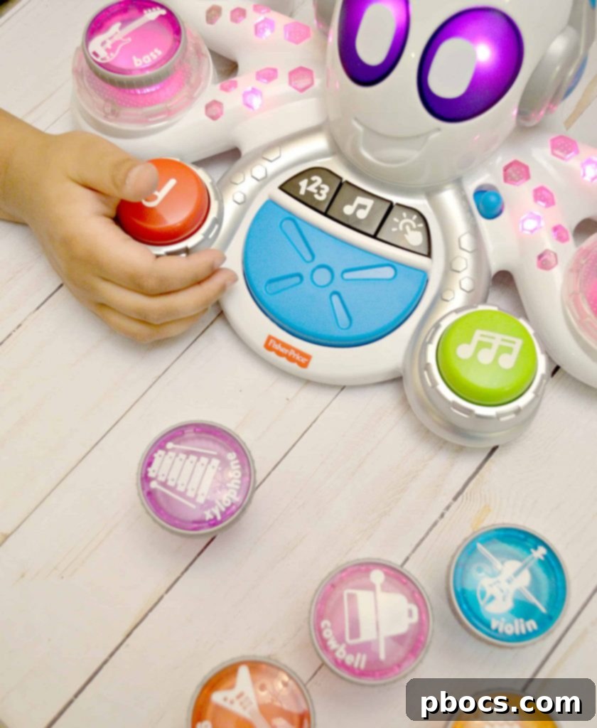 Close-up of Rocktopus toy with kids' hands interacting with instruments