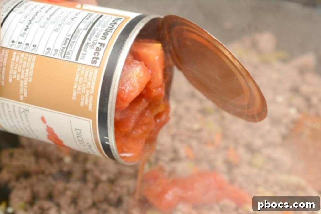 Keto Spaghetti Bolognese simmering in a pot