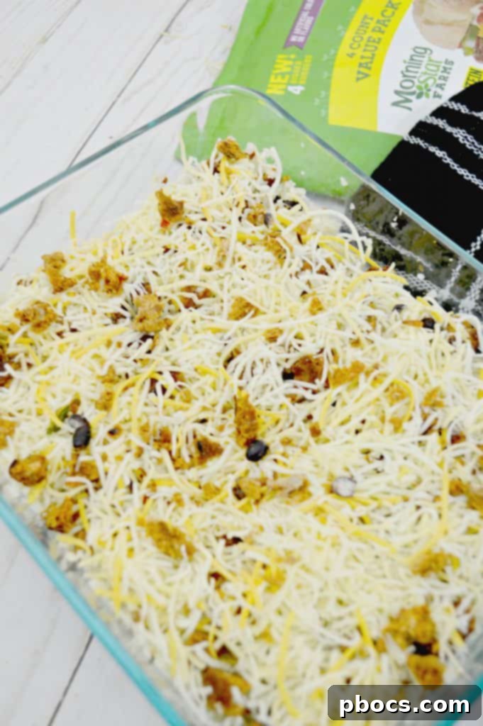 Gooey Tex-Mex Fiesta Bake 7 Casserole ready for baking