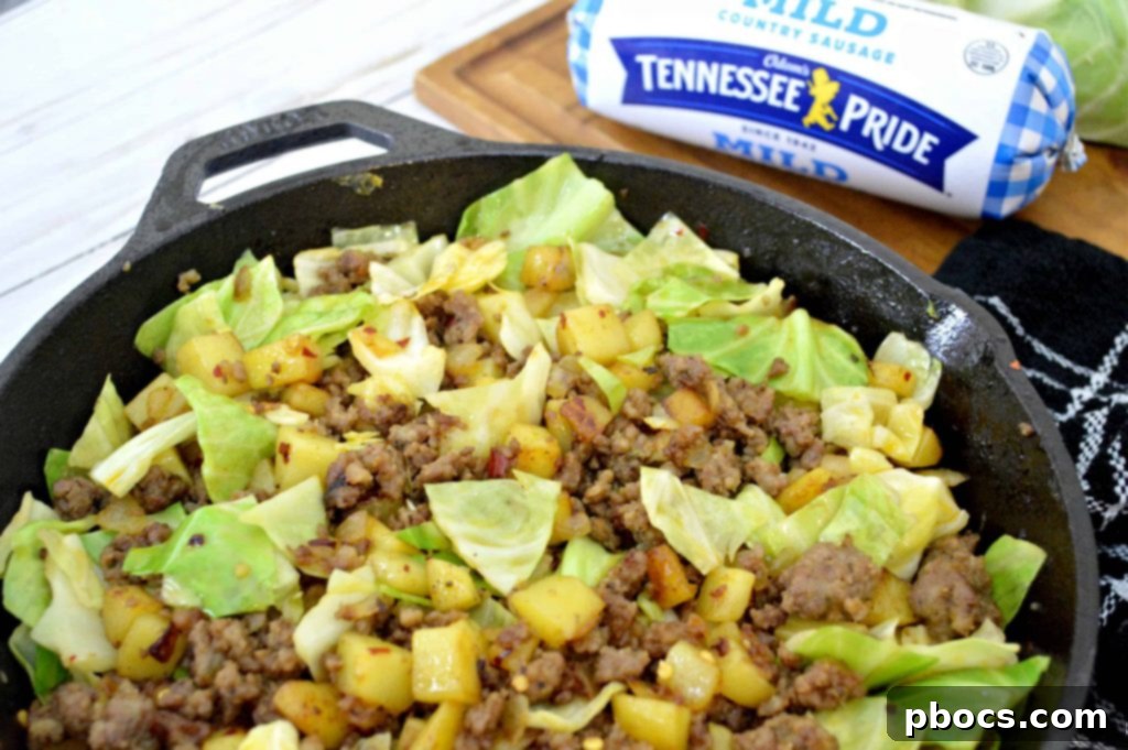 Mixing paprika and red pepper flakes into the hash in the skillet