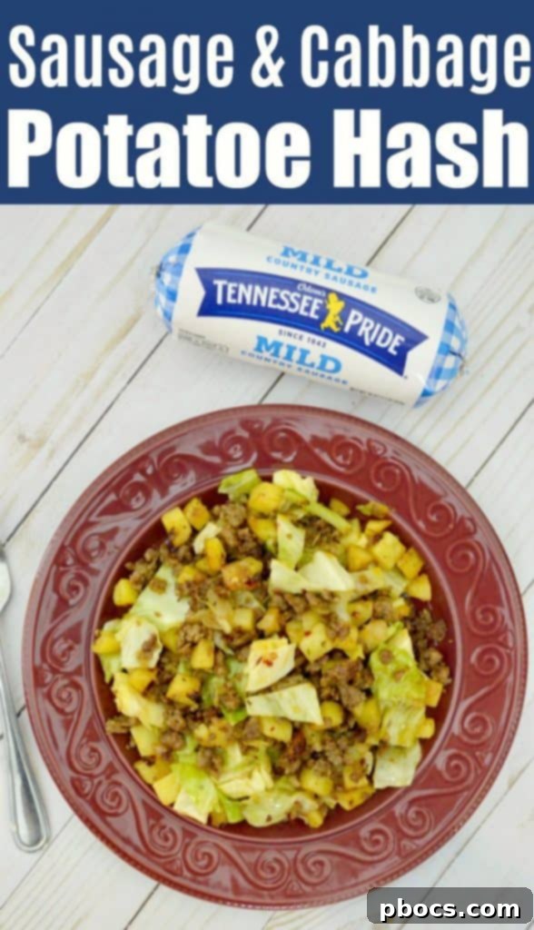 Finished Sausage and Cabbage Potato Hash with a fried egg on top