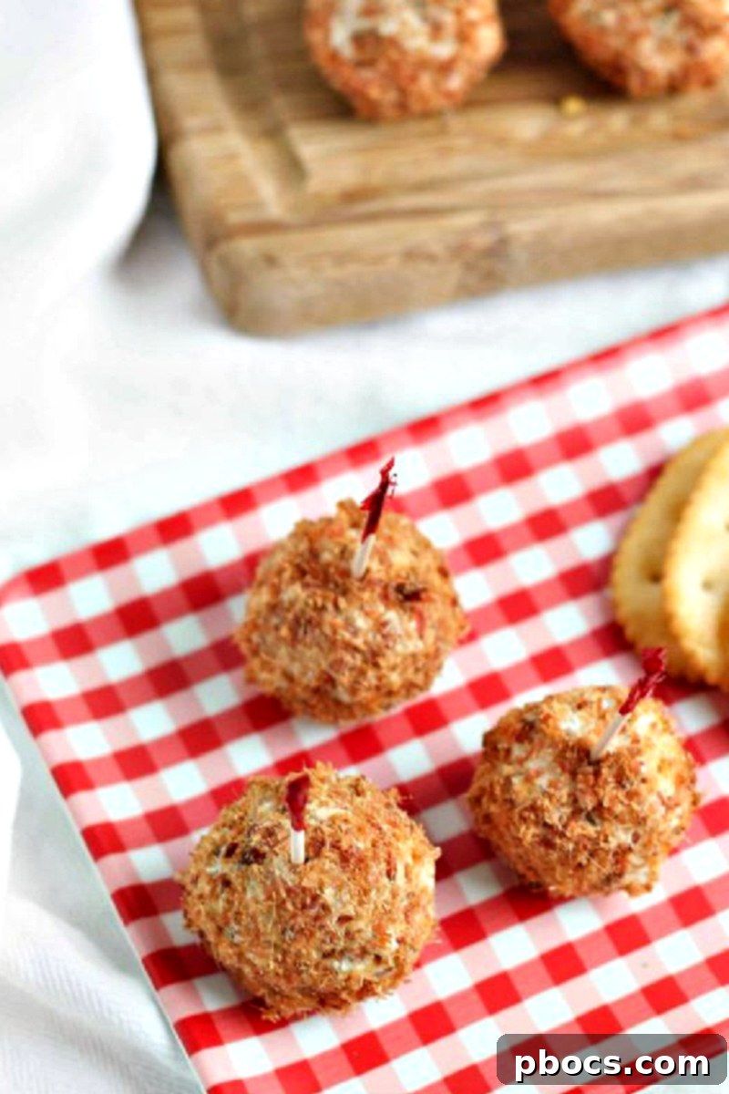 Close-up of Bacon Cheese Ball Bites served with crackers