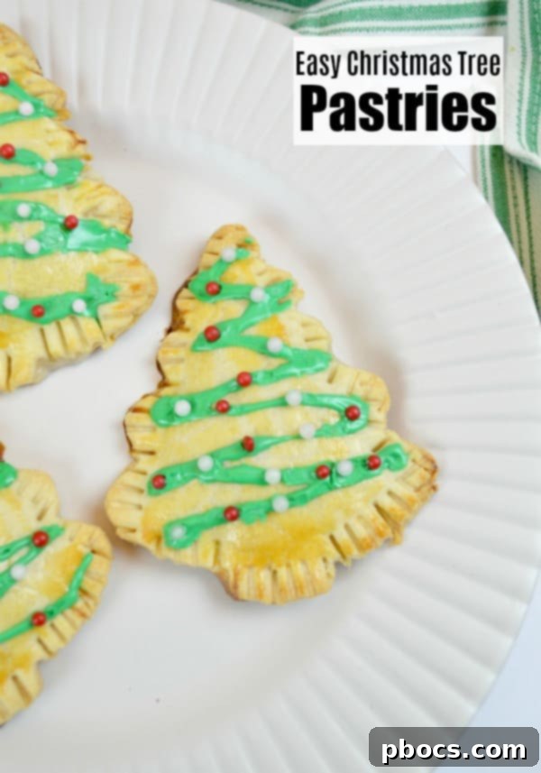 No-Fuss Festive Tree Treats 2 Delicious Christmas tree pastries decorated with icing and sprinkles.