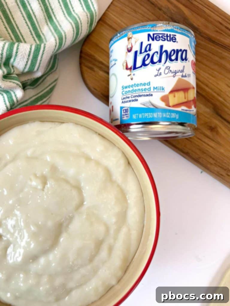 No-Fuss Festive Tree Treats 6 Pudding ingredients being stirred in a saucepan.