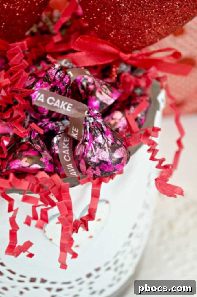 Homemade Valentine's Treat Dish 12 A vibrant display of the DIY Valentine's Day candy dish, filled with HERSHEY'S Lava Cake Kisses, captured in natural light.