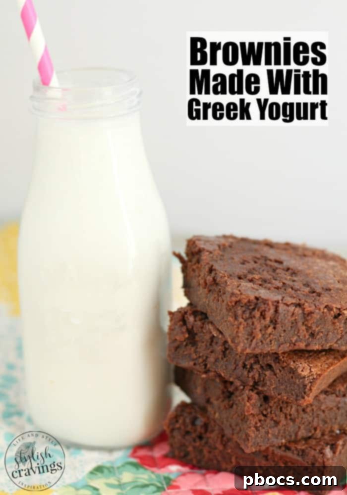 Fudgy Greek Yogurt Brownies 2 Deliciously moist brownies made with Greek yogurt, arranged beautifully on a serving plate.
