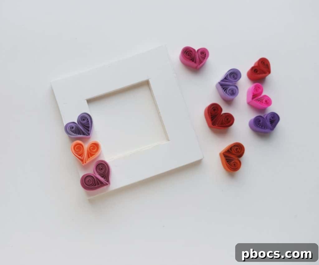 Quilled hearts and frame ready for assembly