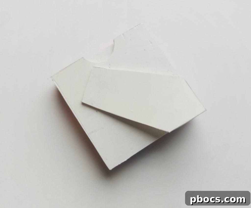 Filling small gaps with tiny quilled coils on the heart frame