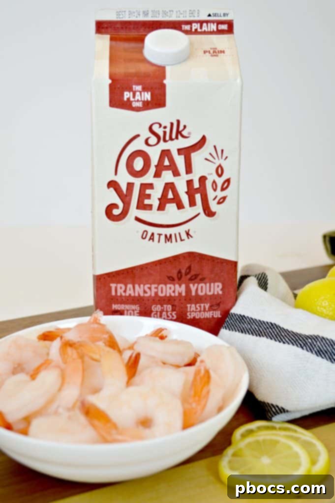 A bowl of Creamy Lemon Parmesan Shrimp ready to be served, highlighting its appealing creamy texture and fresh garnish.