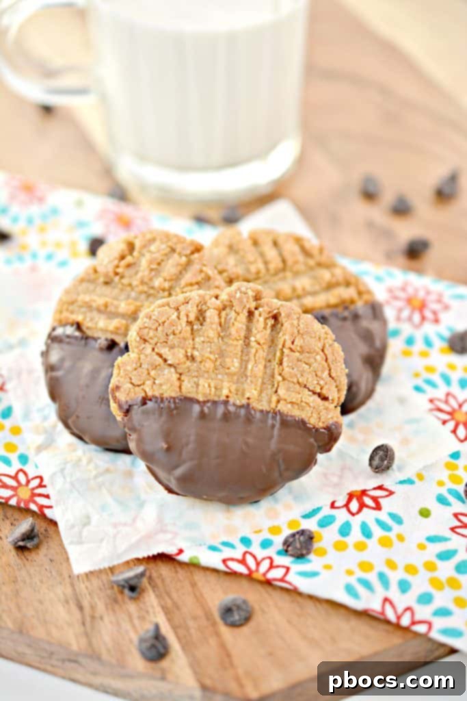 Plate of perfectly baked Keto Chocolate Dipped Peanut Butter Cookies