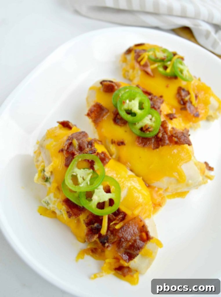 Explosive Jalapeno Popper Chicken 2 Creamy Jalapeno Popper Stuffed Chicken Breast with Golden Cheese and Crispy Bacon