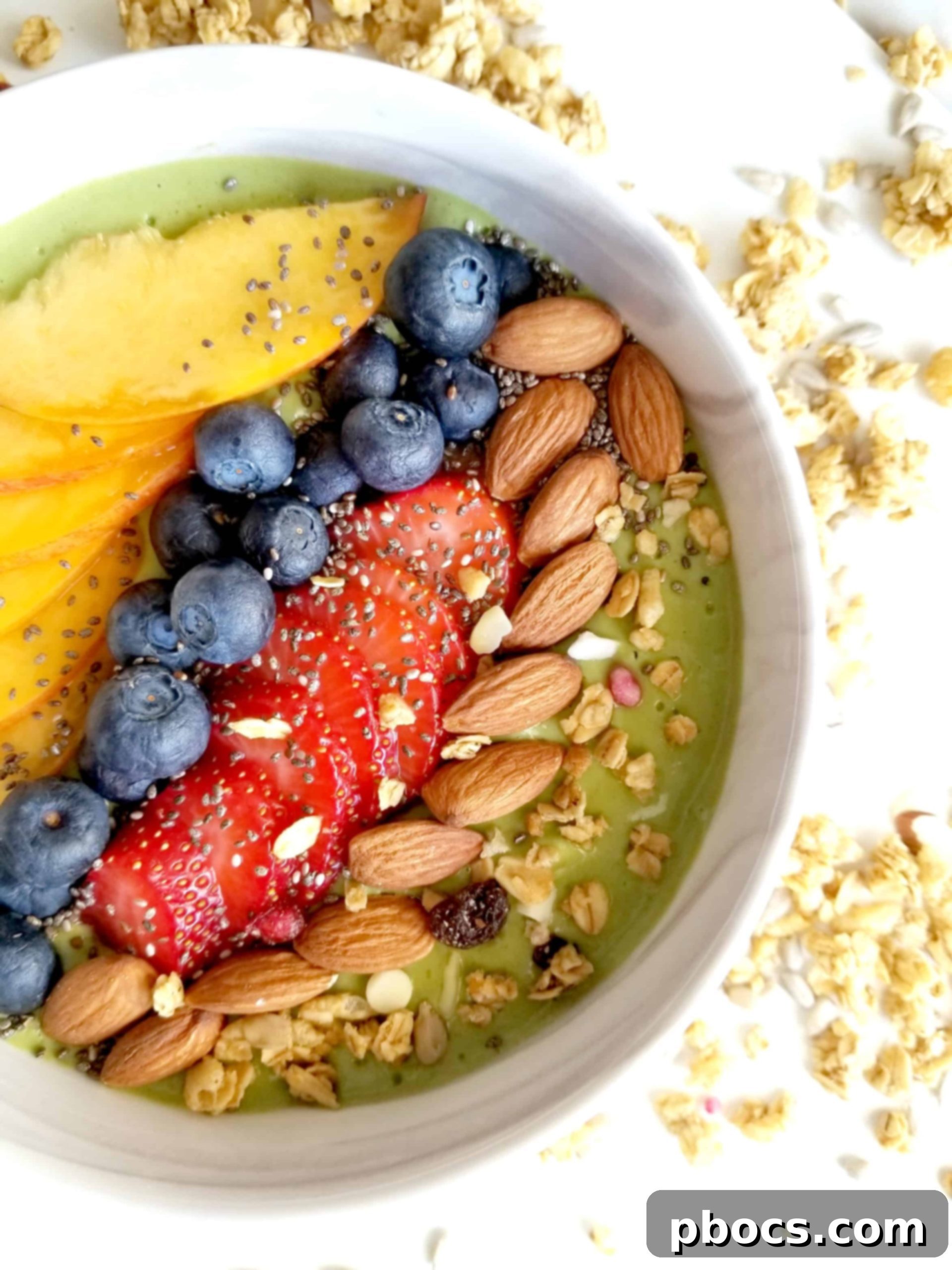 Overhead shot of a vibrant green smoothie bowl, perfect for a healthy breakfast