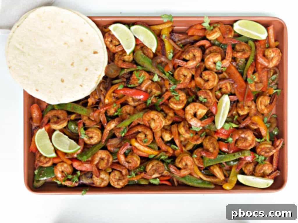 Sizzling Sheet Pan Shrimp Fajitas 8 Sheet Pan Shrimp Fajitas baking in the oven