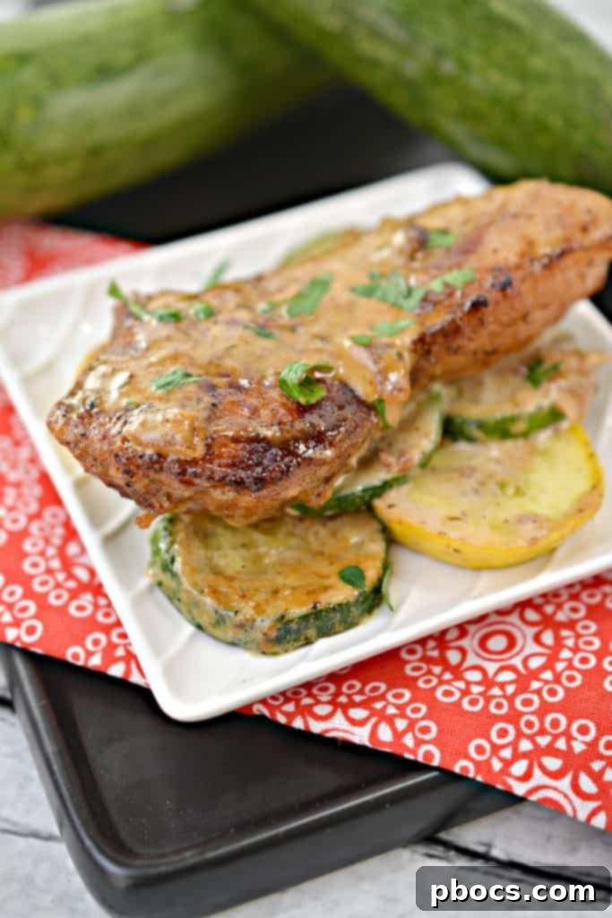 Plated Keto Pork Chops In Mustard Cream Sauce with Sides