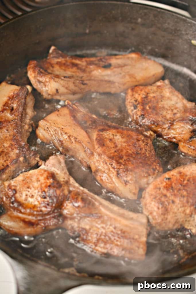 Pork Chops Browning in Skillet