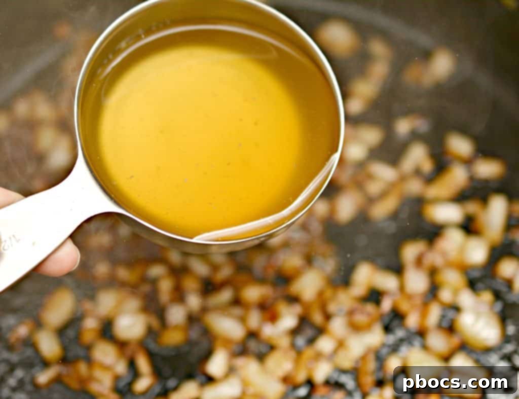 Onions Softening in Skillet for Keto Pork Chops