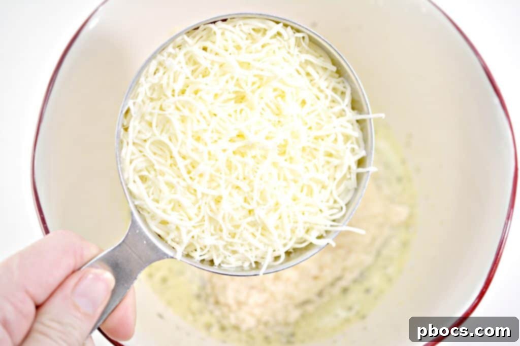 Step 4: Incorporating Parmesan and Mozzarella cheeses