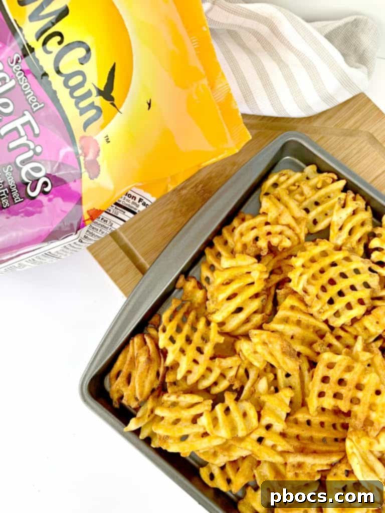 Mixing Buffalo Sauce with Chicken for Fries