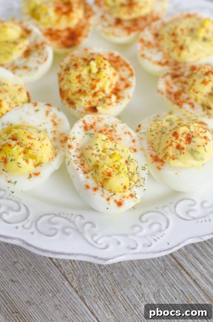 Irresistible Deviled Eggs 3 Classic Deviled Eggs, garnished with paprika