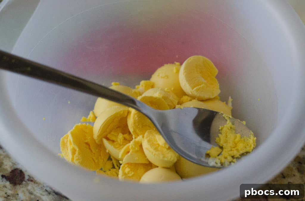 Irresistible Deviled Eggs 5 Step-by-step: yolks removed from egg whites