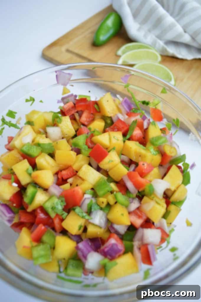 Serving suggestion for Grilled Pork Chops & Peach Salsa with sides