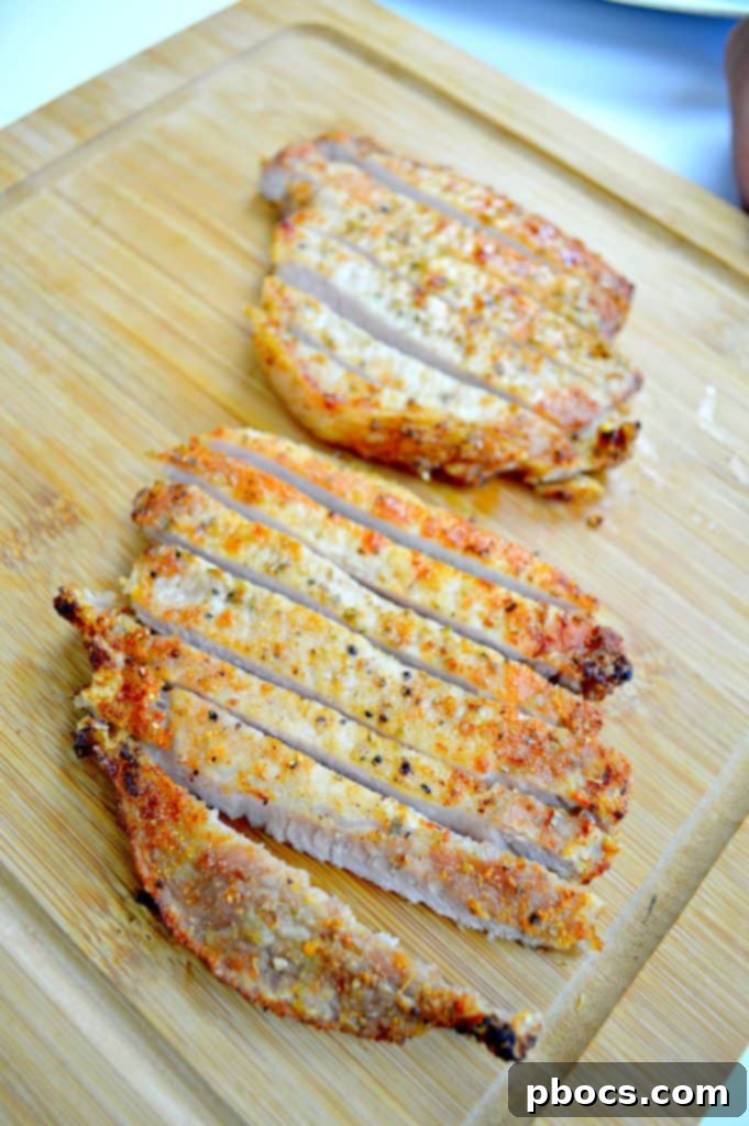 Pork chops grilling on a BBQ