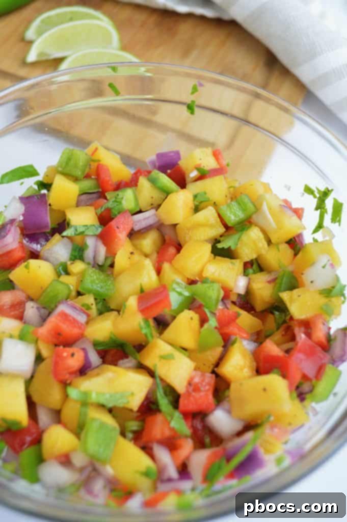 Ingredients for peach salsa in a bowl