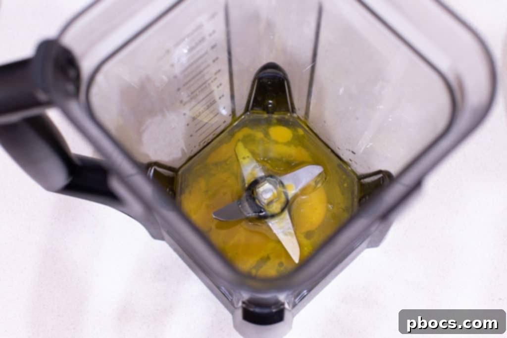 Ingredients for homemade mayonnaise: egg, olive oil, vinegar