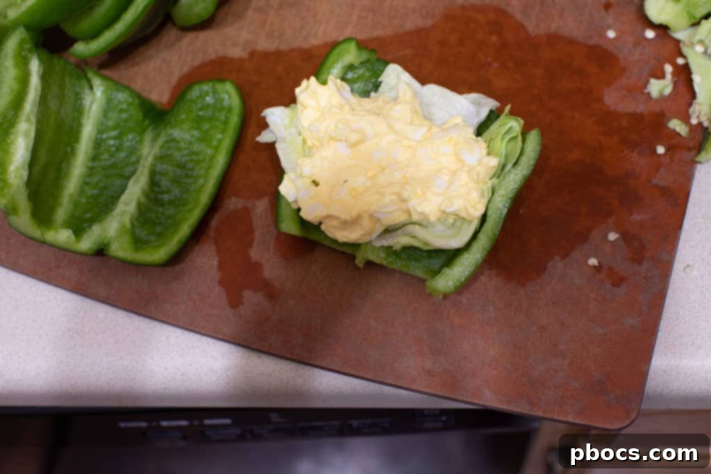 Mixing all ingredients for the creamy Keto egg salad