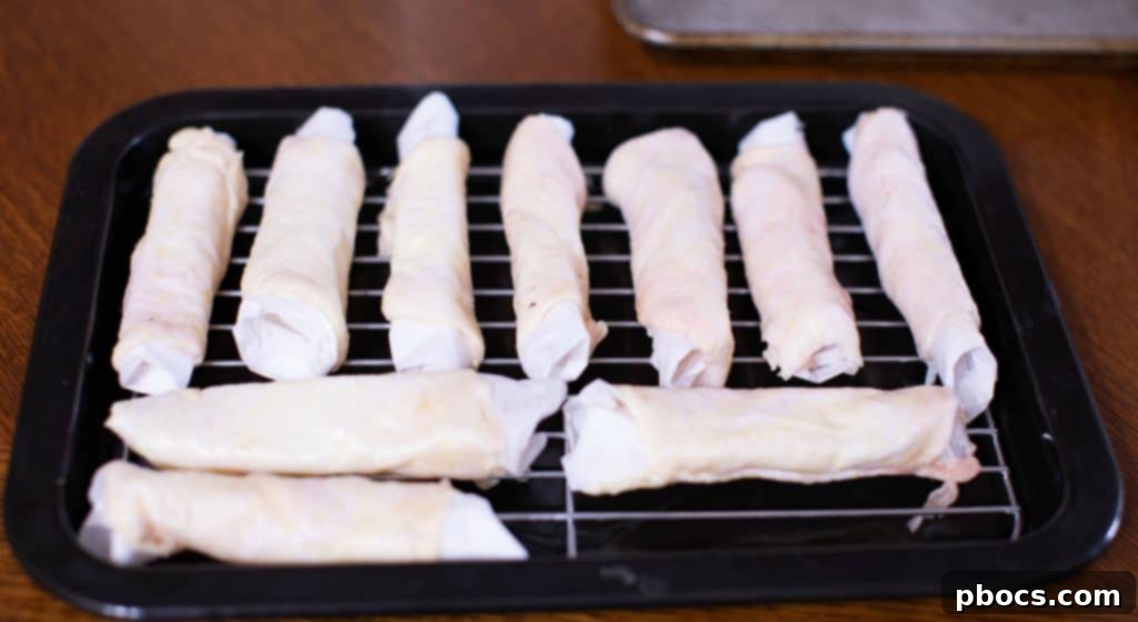 Dynamite Chicken Jalapeño Poppers 7 Chicken Skins Wrapped Around Parchment Paper Tubes