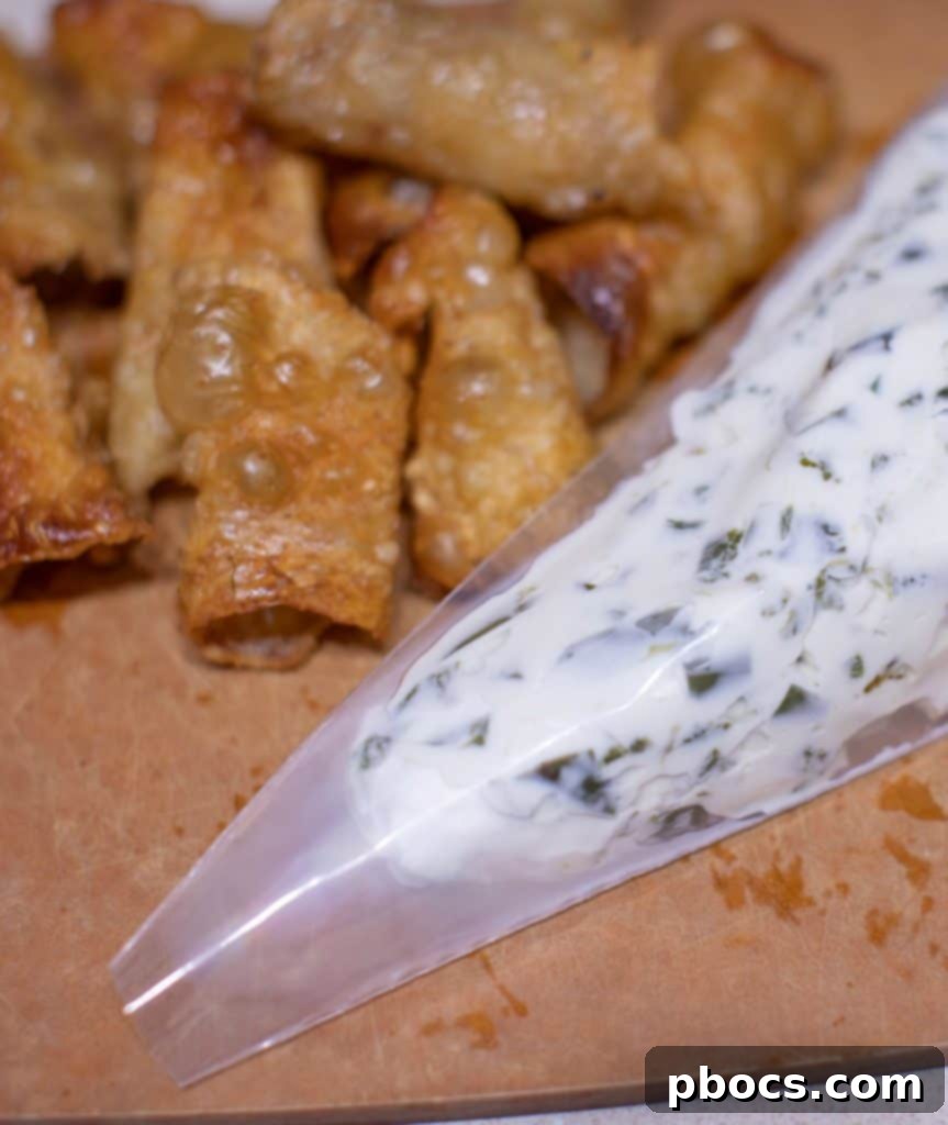 Dynamite Chicken Jalapeño Poppers 9 Removing Parchment Paper from Crispy Chicken Skins