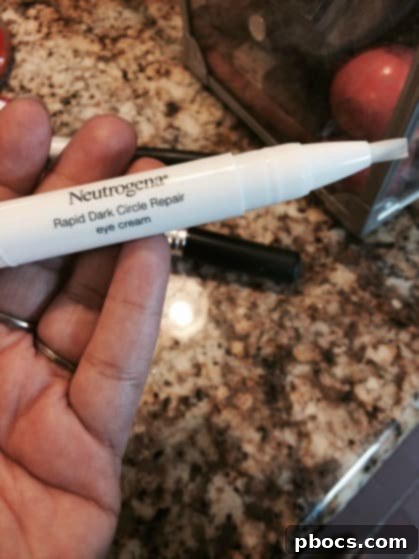 Neutrogena Rapid Dark Circle Repair applied under the eye to brighten and reduce dark circles instantly for a refreshed look