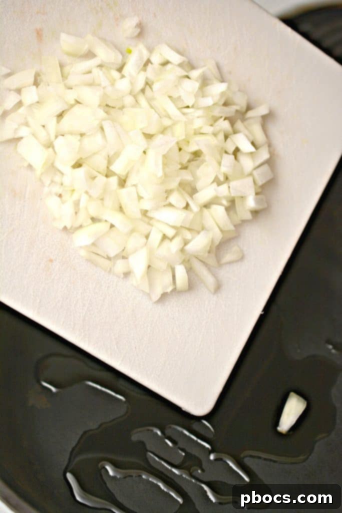Skillet Preparation for Lettuce Wraps Heating oil in a skillet for lettuce wraps