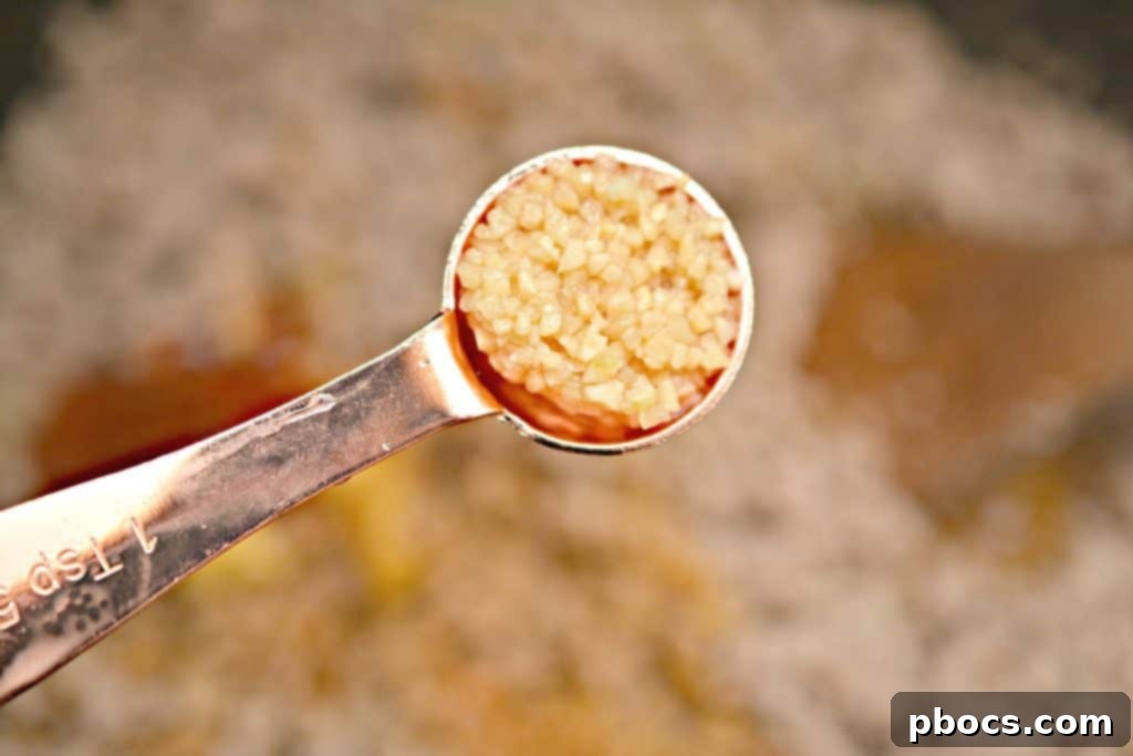 Seasoning the Meat Mixture Adding sauces and seasonings to the meat mixture