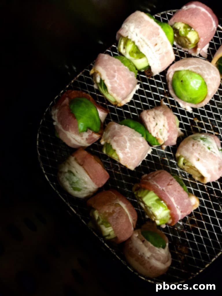 Crispy Air Fryer Bacon Brussels Sprouts 5 Brussel Sprouts being tossed in balsamic dressing