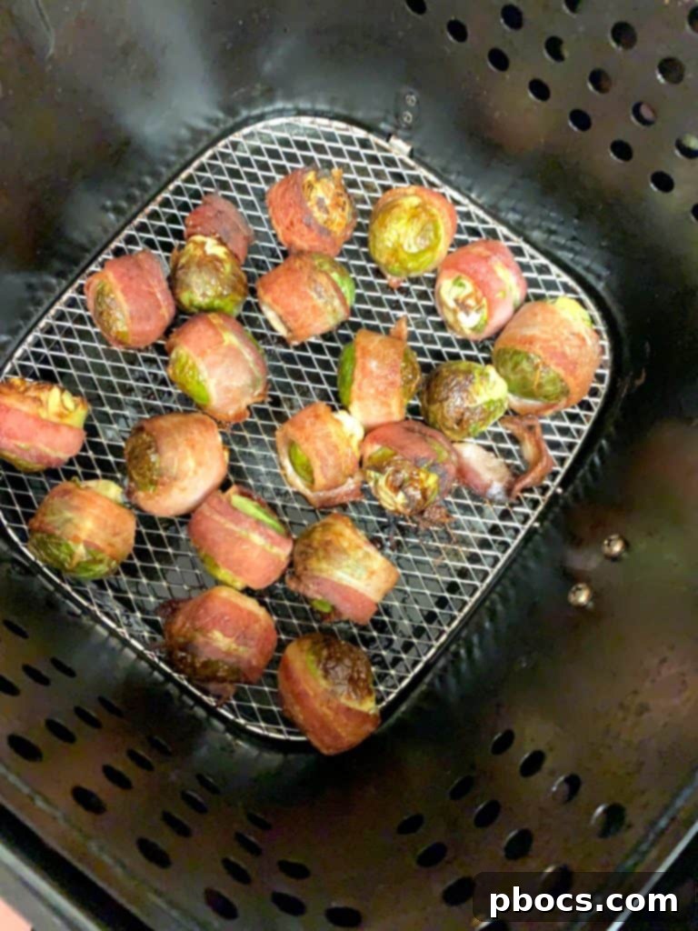 Crispy Air Fryer Bacon Brussels Sprouts 6 Bacon wrapped Brussel Sprouts ready for the air fryer