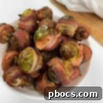 Crispy Air Fryer Bacon Brussels Sprouts 8 Air Fryer Bacon Wrapped Brussel Sprouts - Finished dish image