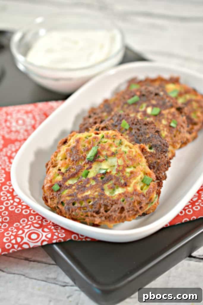Savory Keto Zucchini Bites 2 Delicious and easy Keto Zucchini Fritters, perfect for a low-carb snack or meal.
