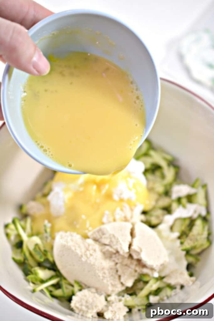 Savory Keto Zucchini Bites 10 Close up of shredded zucchini for Keto Zucchini Fritters.