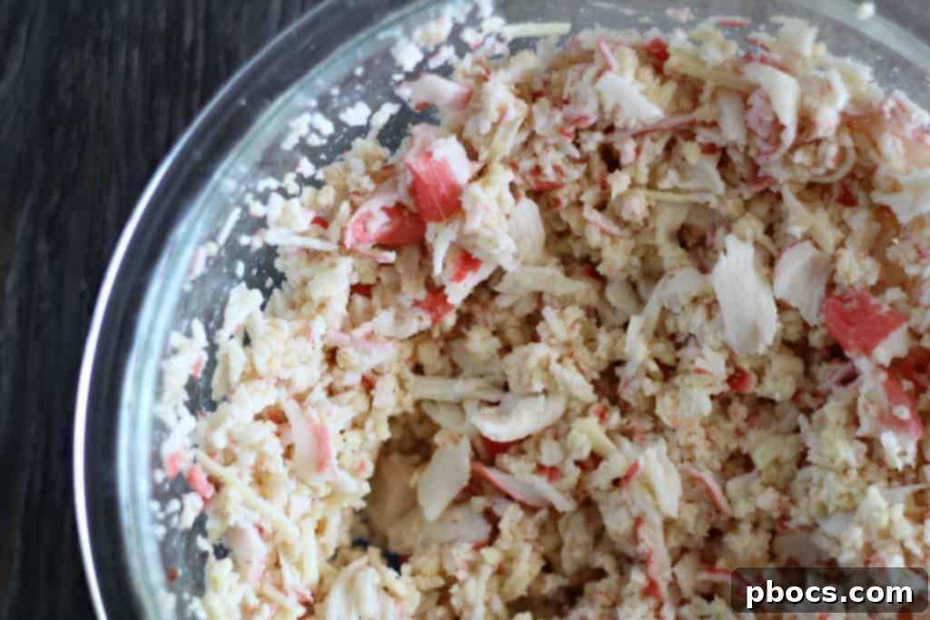 Mixing all ingredients for spicy crab cakes