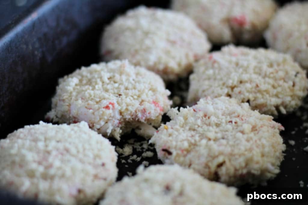 Frying spicy crab cakes in hot oil