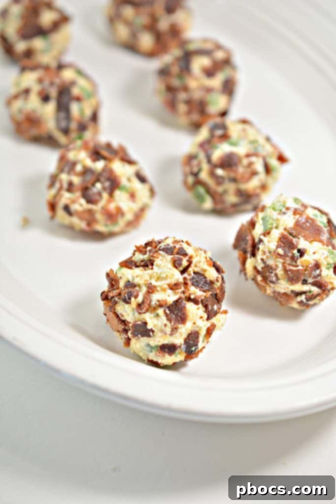 Rolling Jalapeno Popper Fat Bombs in Crumbled Bacon