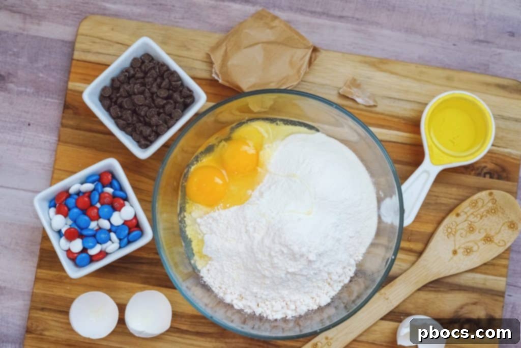Stars and Stripes Cookie Bars 5 Mixing the ingredients for cookie bars in a bowl