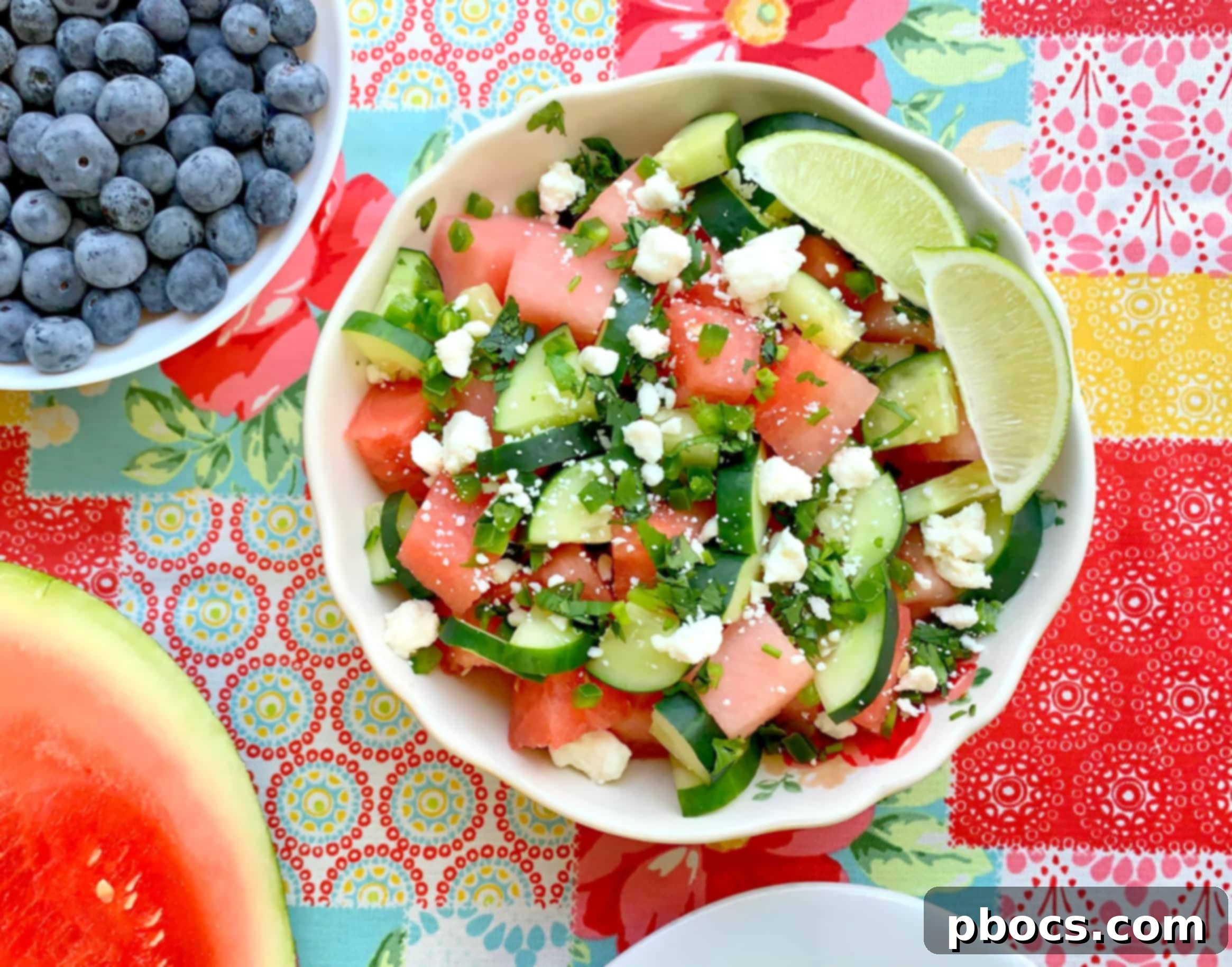 First Cookout with Watermelon Jalapeno Feta Salad 2 Vibrant Watermelon Jalapeno Feta Salad displayed in a clear bowl, showcasing its colorful ingredients and refreshing appeal, perfect for a summer gathering.