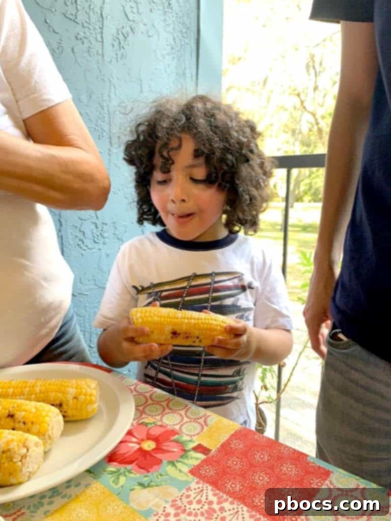 First Cookout with Watermelon Jalapeno Feta Salad 8 A close-up view of a perfectly ripe, sliced watermelon, showcasing its juicy red flesh and black seeds, inviting freshness.