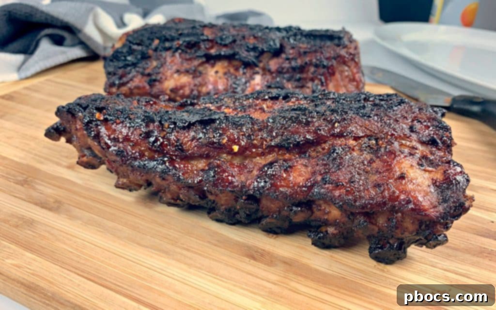 Slices of honey chipotle grilled ribs ready to be served