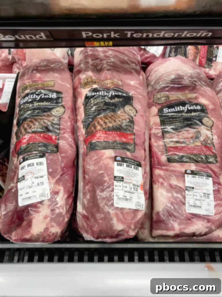 Selection of fresh pork cuts at the store
